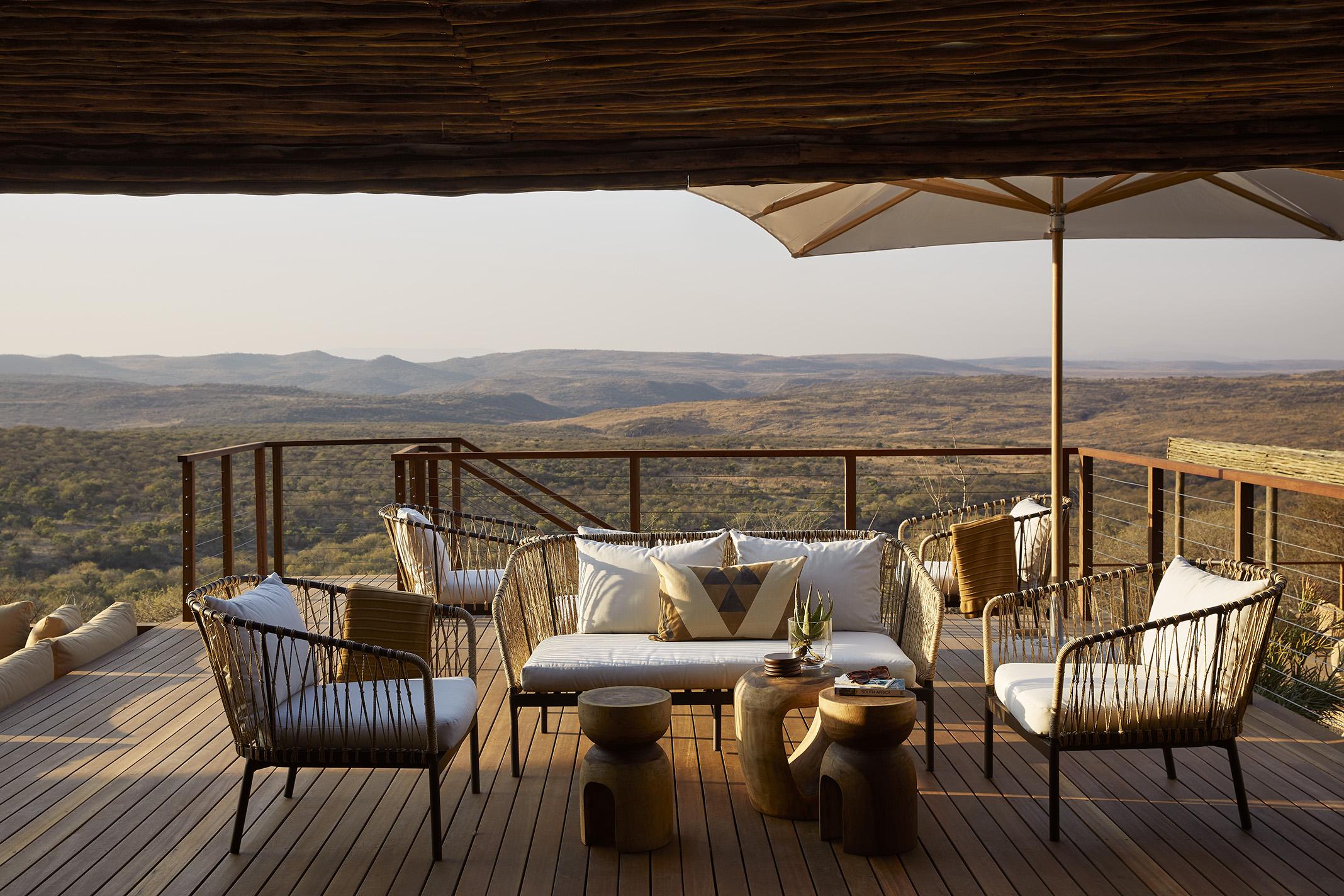 Main lodge exterior front deck seating area 